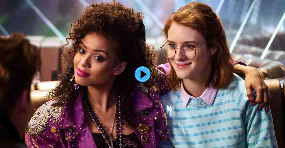 Gugu Mbatha-Raw and Mackenzie Davis as Yorkie and Kelly from the Black Mirror episode "San Junipero," in 1980s-inspired clothing.