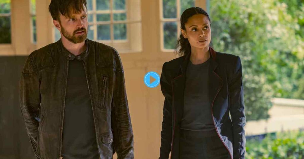 A still from Westworld showing Aaron Paul and Thandiwe Newton as Caleb and Maeve, looking determined.